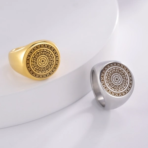 Vintage Viking totem signet rings in gold and silver finish on white geometric stand