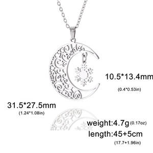 Silver stainless steel moon necklace with cutout patterns and snowflake pendant details