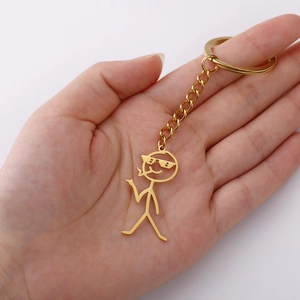 Golden stainless steel Thug Life stickman keychain with sunglasses and cigarette pendant