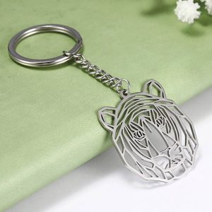 Polished stainless steel tiger head keychain with geometric cutout and metal chain link