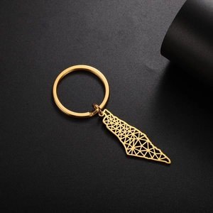 Detail of gold stainless steel keychain with hollow geometric Israel map pendant
