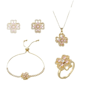 Parure de bijoux trèfle doré avec zircons roses et blancs au design ajouré