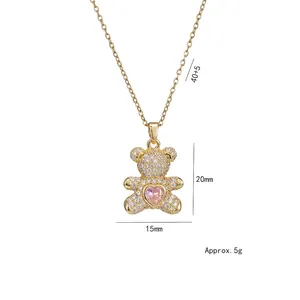 Collier pendentif ours doré avec zircon cœur rose et pierres pavées blanches