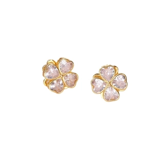 Elegant gold-plated four-leaf clover stud earrings with pink heart-shaped zirconia stones