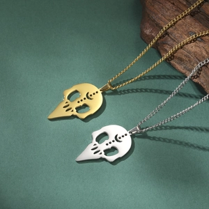 Collar con colgante de calavera de cuervo hueca en acero inoxidable oro y plata
