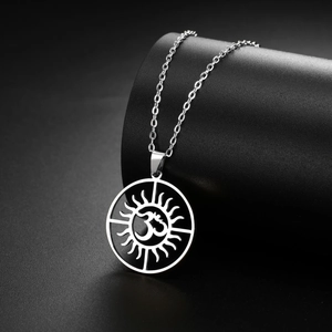 Silver stainless steel Om sun pendant necklace for men and women on minimalist black stand