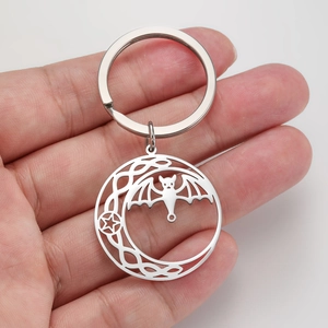 Gothic silver stainless steel keychain featuring hollow bat, moon, and star charms