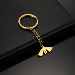 Polished gold stainless steel bat pendant keychain with ring and link chain detail