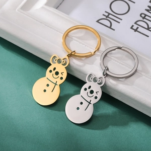 Cute snowman stainless steel keychains in gold and silver finish with festive bow charms