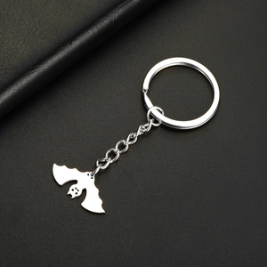 Detailed view of a silver stainless steel keychain featuring a unique bat-shaped pendant