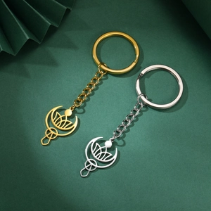 Détails des porte-clés lotus et lune en acier inoxydable aux finitions or et argent