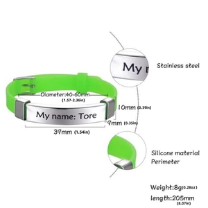 Macro detail of custom name engraving on adjustable silicone medical ID bracelet for kids