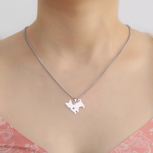 Polished stainless steel necklace featuring a cute cutout dog pendant on a delicate chain