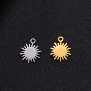Detail of sunburst pendants in gold and silver finish for DIY jewelry making