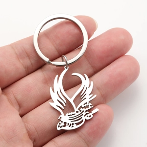 Polished stainless steel bird keychain with Arabic calligraphy cutout in silver finish