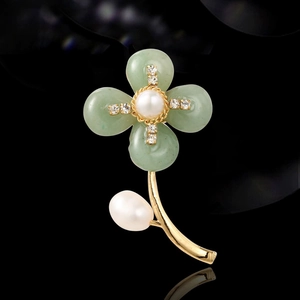 Green stone flower brooch with white baroque pearls and gold-plated floral frame