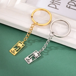 Porte-clés en acier inoxydable or et argent avec pendentifs de palmier et vagues