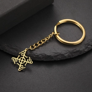 Detailed view of a gold stainless steel keychain with a Nordic rune hollow pendant