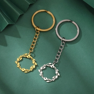 Porte-clés couronne de laurier en acier inoxydable poli finitions or et argent