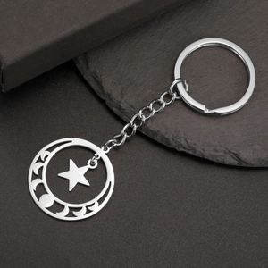 Polished stainless steel keychain with cutout pentacle and crescent moon goddess charms