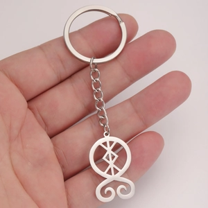 Polished stainless steel keychain with hollow troll cross pendant on chain in palm