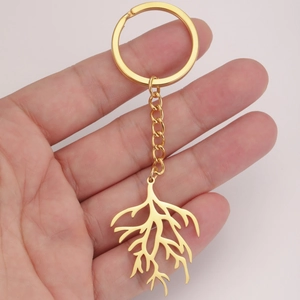 Golden stainless steel keychain featuring a geometric coral branch pendant with polished finish