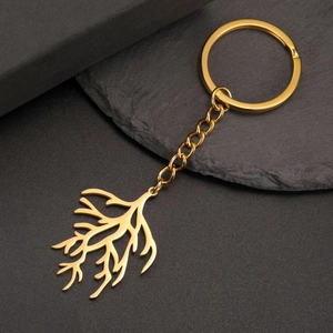 Detailed view of a gold-plated stainless steel keychain with branch-shaped coral pendant