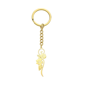 Polished gold stainless steel keychain featuring a hollow floral vine scroll pendant