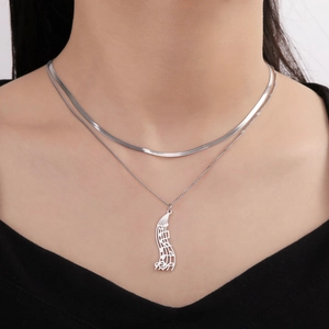 Double-layer stainless steel necklace featuring a music note pendant on a sleek snake chain