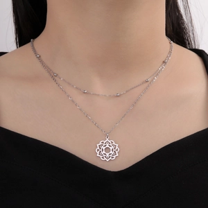 Minimalist double-layered stainless steel necklace with geometric hollow pendant on model