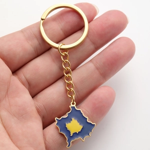 Handheld gold stainless steel keychain featuring a blue Kosovo map pendant with oil drip finish