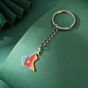 Cameroon map keychain in green red yellow flag colors with a gold star and chain