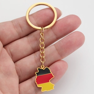 Detailed macro shot of a Germany map keychain with national flag colors and gold finish