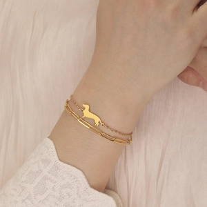 Double-layer gold stainless steel bracelet featuring dachshund pendant and paperclip chain