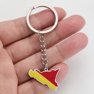 Detailed view of Sicily map keychain with yellow and red enamel on polished steel chain
