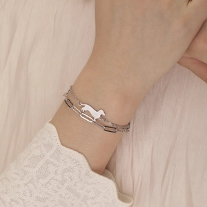 Minimalist stainless steel double-layered bracelet featuring a polished dachshund dog charm