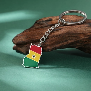 Detailed close-up of a Ghana map keychain with red, yellow, and green flag colors