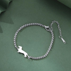 Detail of dachshund silhouette charm on stainless steel box chain with lobster clasp