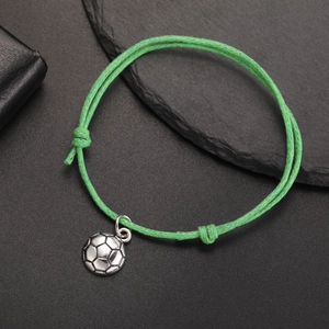 Detail of green adjustable cord bracelet with high-quality silver football soccer charm