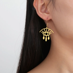 Bohemian gold eyelash evil eye drop earrings on model for women minimalist jewelry style