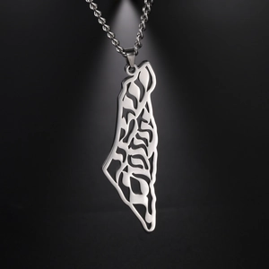 Macro view of stainless steel Israel map pendant with Hebrew script and cross chain detail