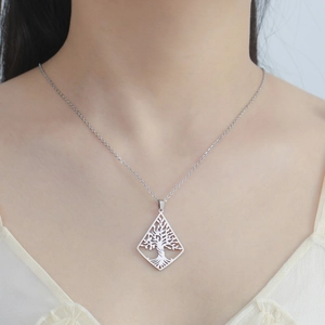 Silver stainless steel necklace with geometric triangle tree of life cutout pendant