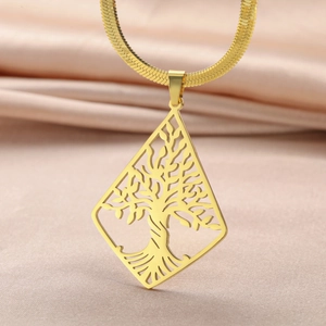 Detail of gold-plated stainless steel tree of life pendant on a sleek snake chain