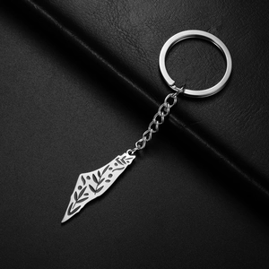 Detailed macro view of the silver stainless steel Israel map keychain on black leather