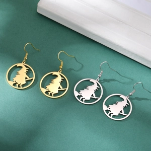 Detail of gold and silver witch riding broomstick hollow round earrings with hooks