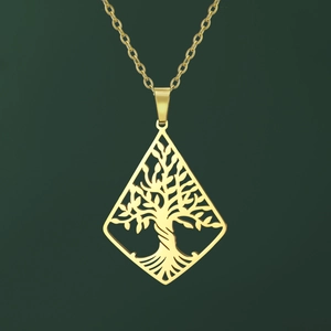 Macro detail of gold tree of life hollow pendant with diamond shape geometric frame