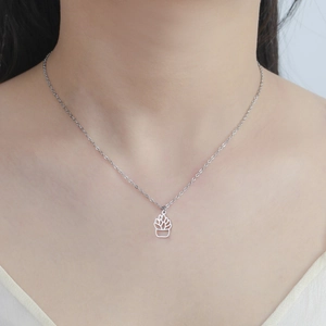 Minimalist stainless steel necklace featuring a hollow succulent plant pendant for women