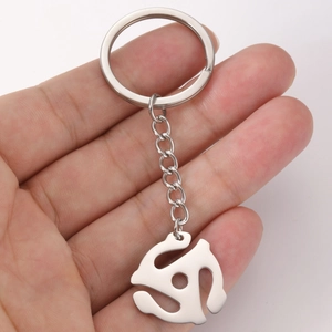 Polished stainless steel keychain with spiral spider vinyl record adapter charm on ring