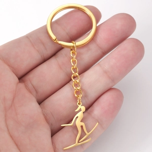 Porte-clés Silhouette de Skieur en Acier au Titane Porte-clés de Sport Minimaliste Pendentif de Sac Cadeau Bijoux Mode