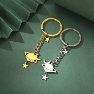 Saturn and moon celestial keychains in gold and silver finish for car keys